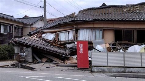 Japan lowers its tsunami warning but still tells people not to go home after a series of earthquakes